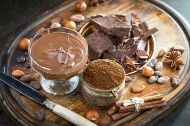 Cocoa beans on old background