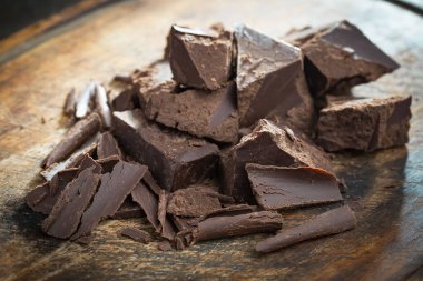 Cocoa beans on old background