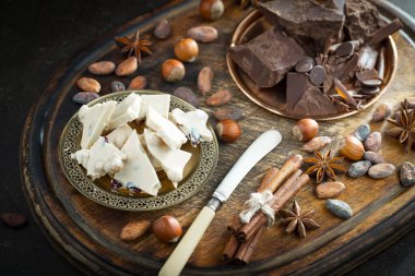 Cocoa beans on old background