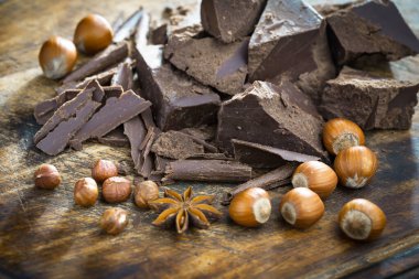 Cocoa beans on old background