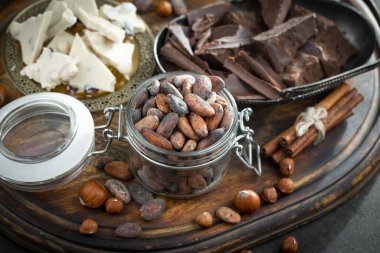 Cocoa beans on old background