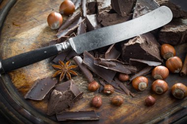 Cocoa beans on old background
