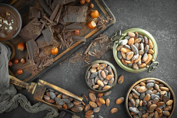 Cocoa beans on old background