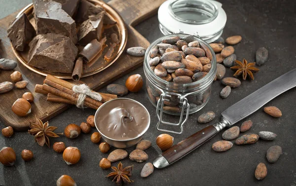 Cocoa beans on old background