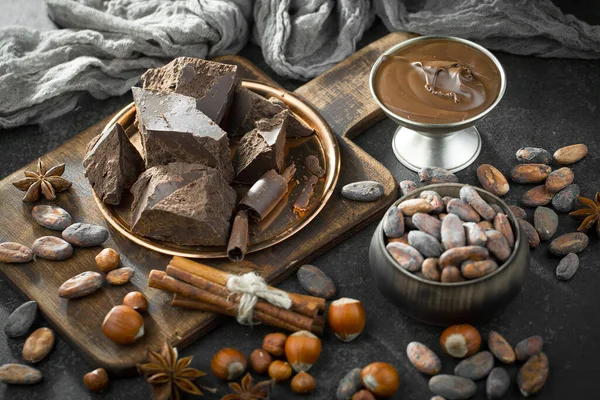Cocoa beans on old background