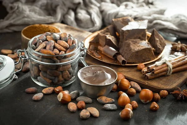 Cocoa beans on old background