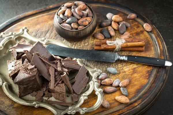 Cocoa beans on old background