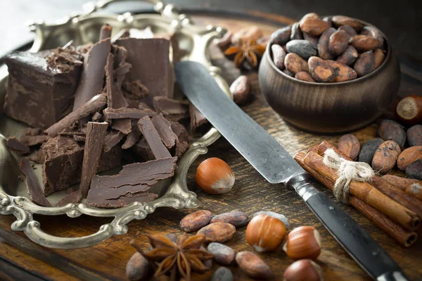 Cocoa beans on old background