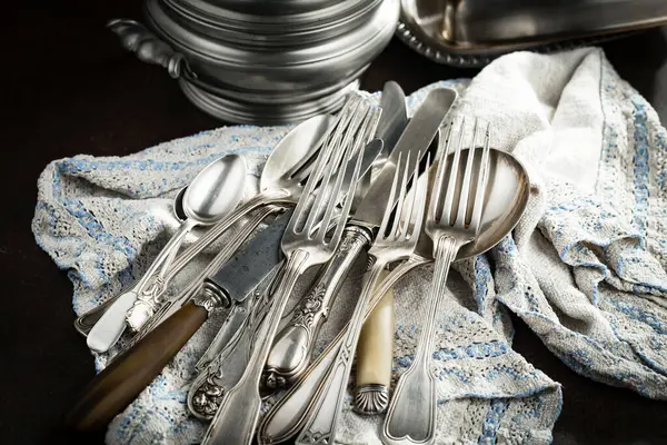 Silverware on an old background.