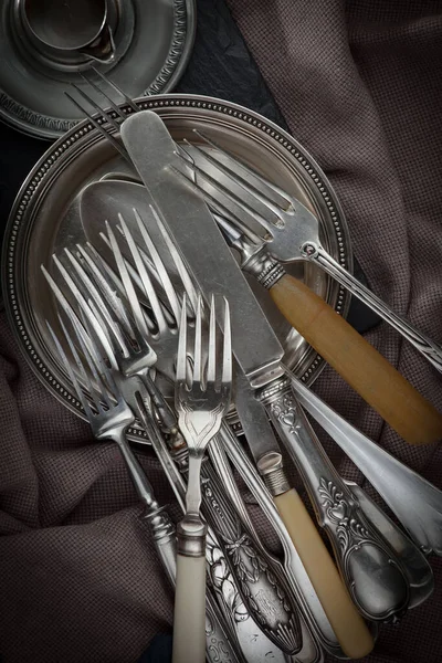 Platos Plata Sobre Fondo Viejo —  Fotos de Stock