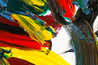 Yağlı boyalarla tuvale yapılan soyut fırça darbeleri.