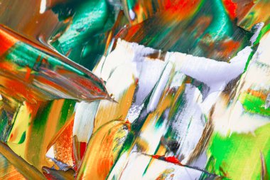 Yağlı boyalarla tuvale yapılan soyut fırça darbeleri.