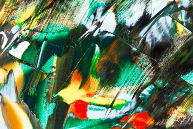 Yağlı boyalarla tuvale yapılan soyut fırça darbeleri.