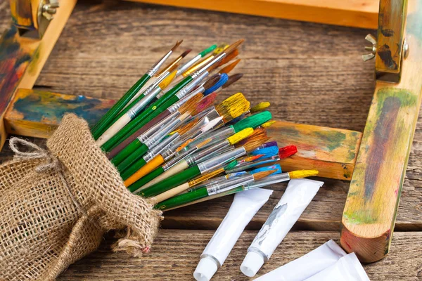 Paints and brushes — Stock Photo, Image