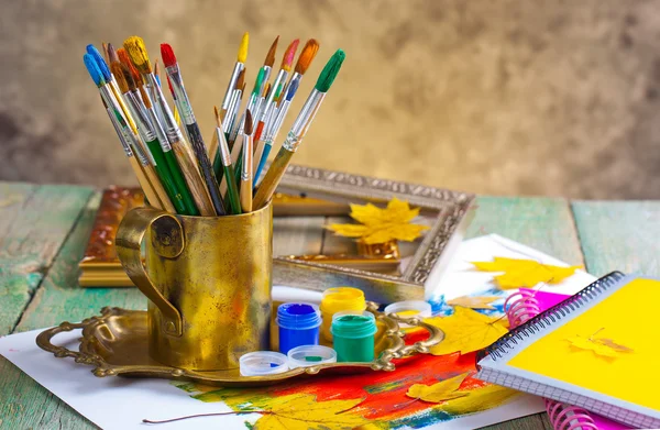 Paints and brushes — Stock Photo, Image