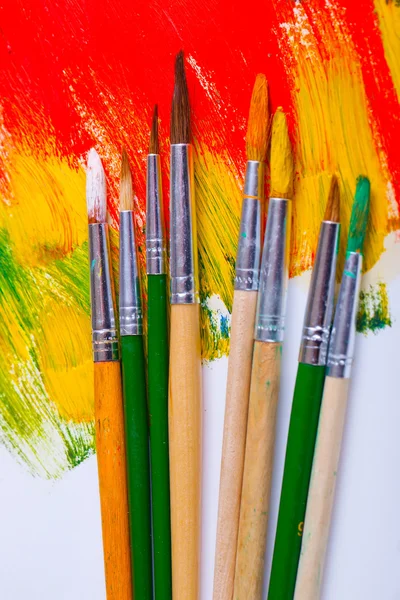 Paints and brushes — Stock Photo, Image