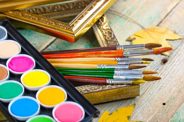 Paints and brushes — Stock Photo, Image