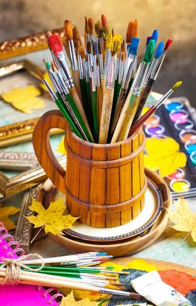 Paints and brushes — Stock Photo, Image