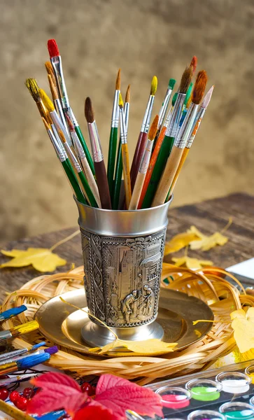 Paints and brushes — Stock Photo, Image