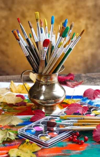 Paints and brushes — Stock Photo, Image