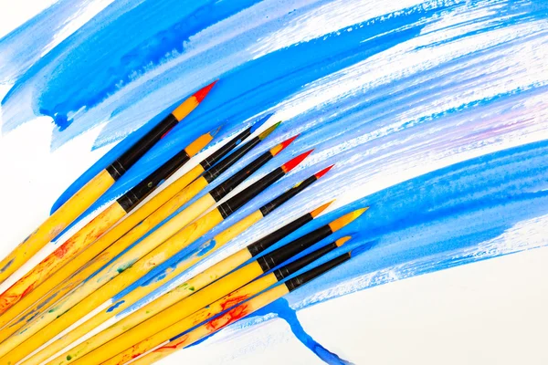 Paints and brushes — Stock Photo, Image