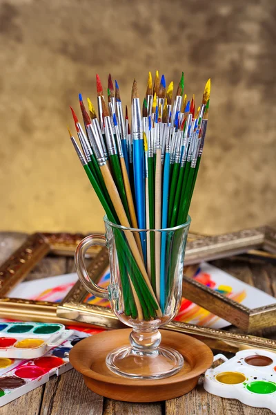 Paints and brushes — Stock Photo, Image