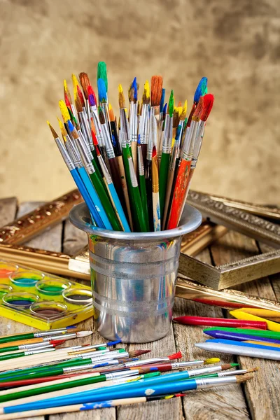 Paints and brushes — Stock Photo, Image