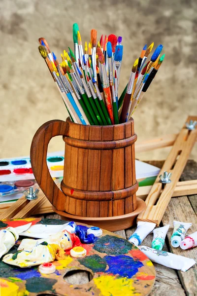 Paints and brushes — Stock Photo, Image