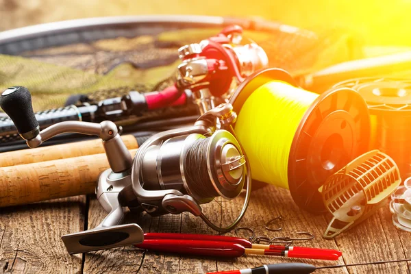 Fishing tackle on a wooden table — Stock Photo, Image