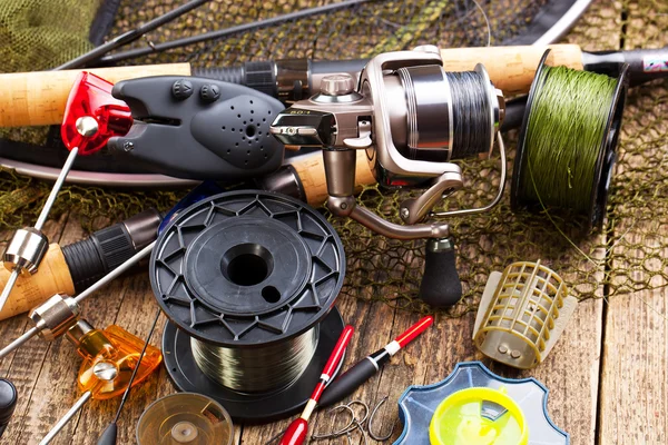 Fishing tackle on a wooden table — Stock Photo, Image