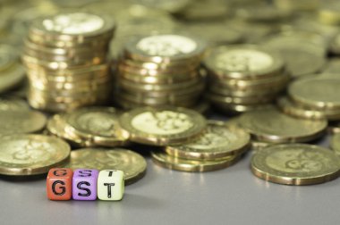 GST metin ve altın sikkeler