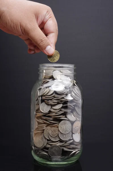 Glass Jar, Hand with Coins — Stock Photo, Image