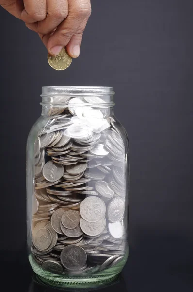 Glass Jar, Hand with Coins — Stock Photo, Image