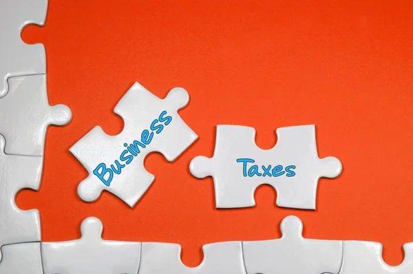Business Taxes Text - Business Concept Stock Photo