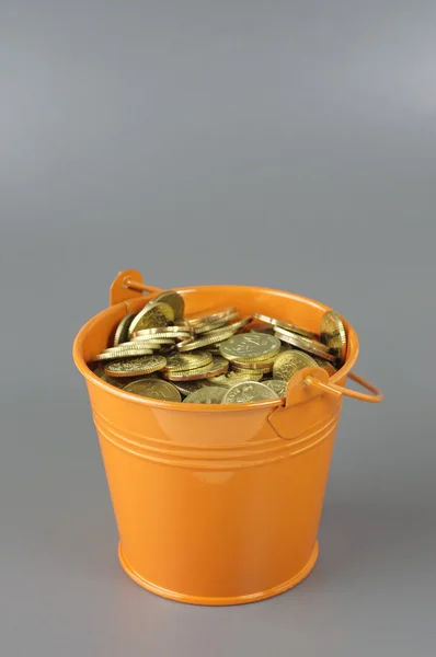 Gold Coins in the Bucket - Financial Concept — Stock Photo, Image