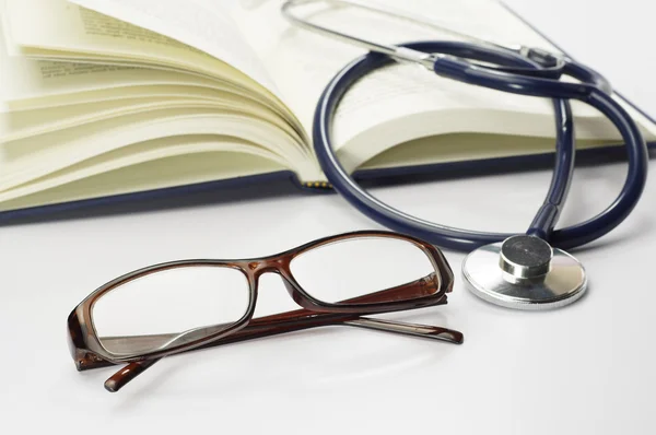 Book, Stethoscope and Glasses - Conceptual — Stock Photo, Image