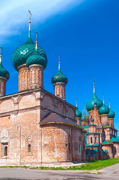 Ancient repairing church of red brick in sunny day — Stock Photo, Image