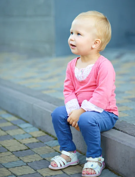 Portrait of a child on chair — Stock Photo, Image