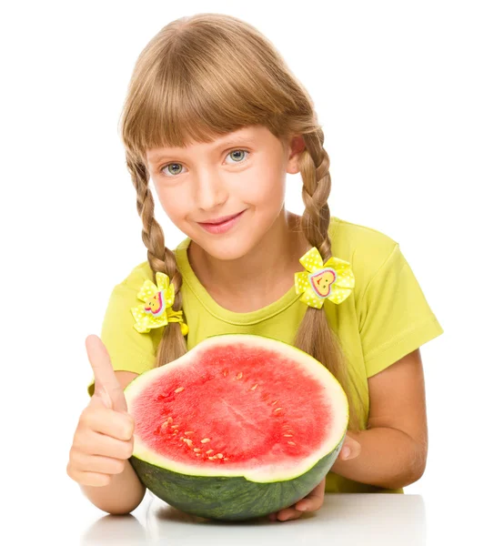 Niña está comiendo sandía — Foto de Stock