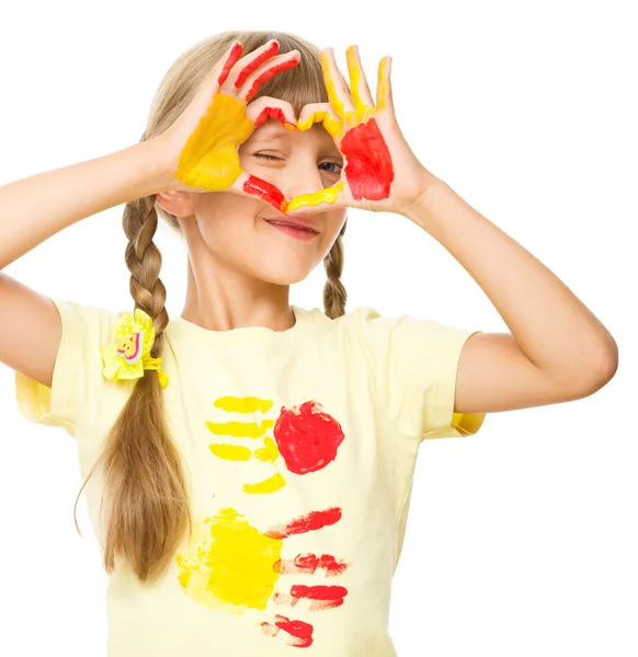 Portrait of a cute girl playing with paints — Stock Photo, Image