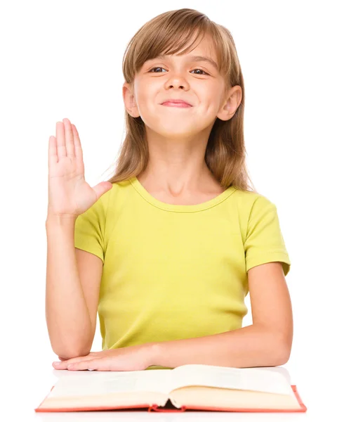 Little girl is rising her hand up — Stock Photo, Image