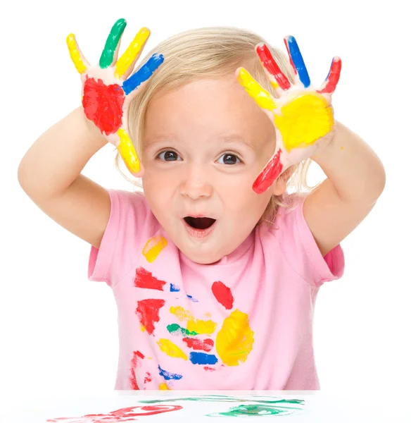 Portrait of a cute little girl playing with paints — Stock Photo, Image