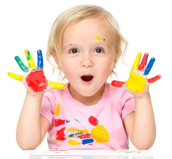 Portrait of a cute little girl playing with paints — Stock Photo, Image