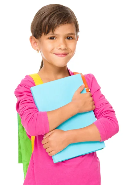 Jong meisje houdt boek — Stockfoto