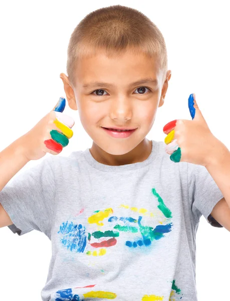 Portrait of a cute boy playing with paints — Stock Photo, Image