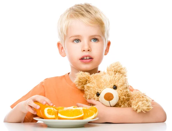 Portrait of a little boy with his teddy bear — Stock Photo, Image