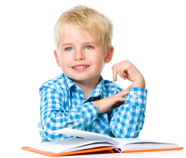 Little child play with book — Stock Photo, Image