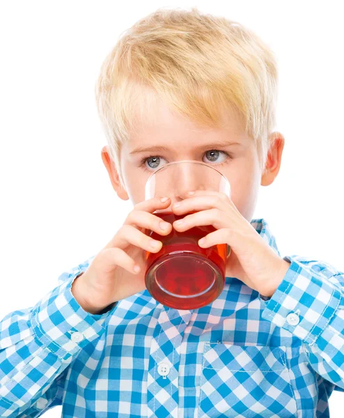 Menino com copo de suco de cereja — Fotografia de Stock