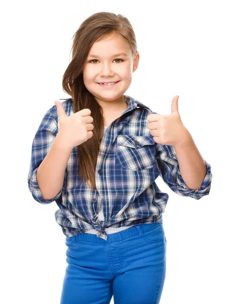 Niña está mostrando el pulgar hacia arriba gesto —  Fotos de Stock