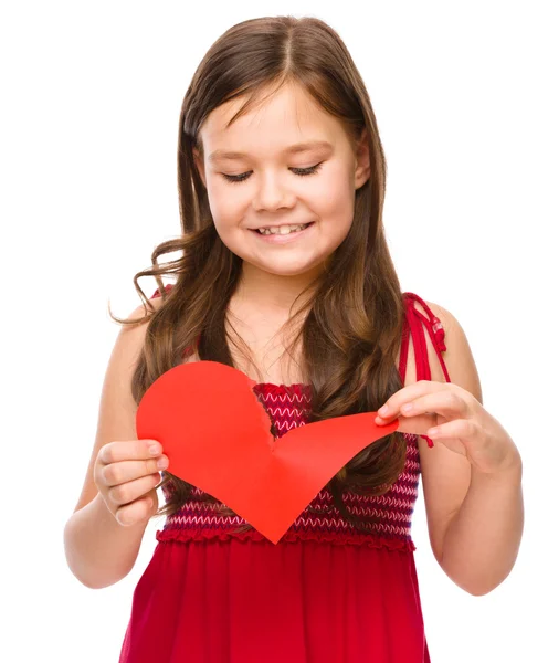 Portrait of a happy little girl in red — Stock Photo, Image